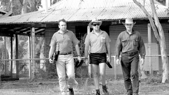 Policeman David Parkinson (centre), federal officers Jeff Penrose (left) and Blaise O'Shaughnessy search the remote West Australian sheep station used as a testing ground for the deadly nerve gas sarin used in the subway gas bomb attack in Tokyo.