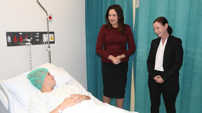 Premier of Queensland Annastacia Palaszczuk (C), and Health Minister D'Ath (right) speak with patient Catlin Sippel at the Mater Private hospital in Springfield Picture: NCA NewsWire / Jono Searle