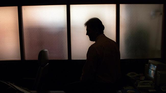 Generic image. Silhouette of a man (parent of) a sex abuse victim in an office. wrongly accused of touching young girl. Child sexual abuse. sex crime incest paedophilia.