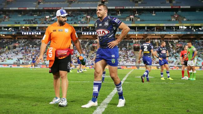 Josh Reynolds leaves the field with a hamstring injury.