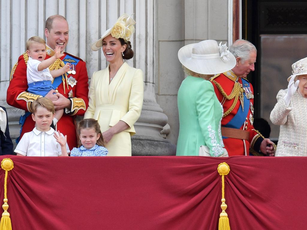 Britain's Prince William, Duke of Cambridge holding Prince Louis, Prince George, Princess Charlotte, Britain's Catherine, Duchess of Cambridge, Britain's Camilla, Duchess of Cornwall, Britain's Prince Charles, Prince of Wales and Britain's Queen Elizabeth II. Picture: AFP