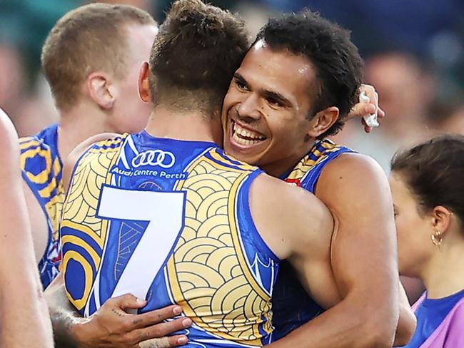 SYDNEY, AUSTRALIA - JUNE 06: Jamaine Jones of the Eagles celebrates with Zac Langdon after kicking a goal during the round 12 AFL match between the Carlton Blues and the West Coast Eagles at Sydney Cricket Ground on June 06, 2021 in Sydney, Australia. (Photo by Mark Kolbe/Getty Images)