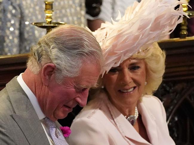 Charles and Camilla couldn’t hold in their giggles. Picture: AFP/Jonathan Brady