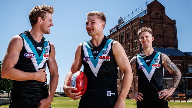 Port Adelaide's 2019 leadership group, co-captains Tom Jonas and Ollie Wines with deputy Hamish Hartlett at Harts Mill, Port Adelaide. Picture: MATT TURNER