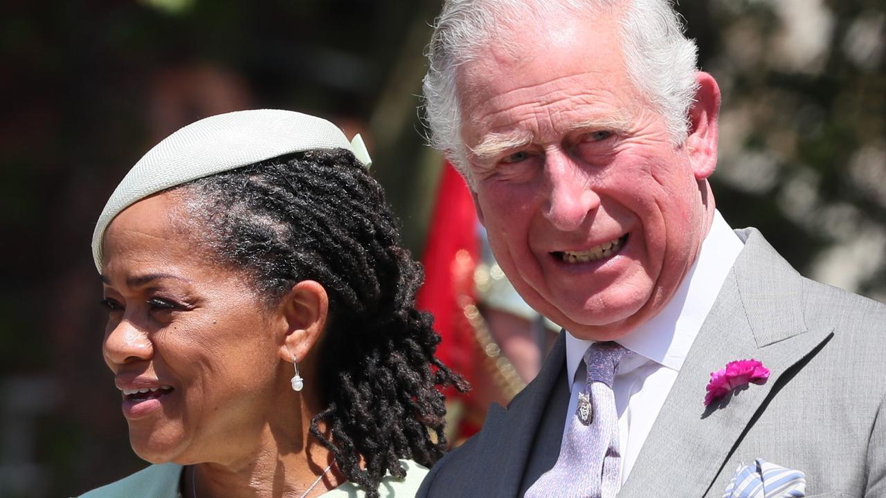 Charles looked delighted as he escorted Meghan’s mum Doria out of the church. Picture: Brian Lawless/WPA Pool/Getty Images