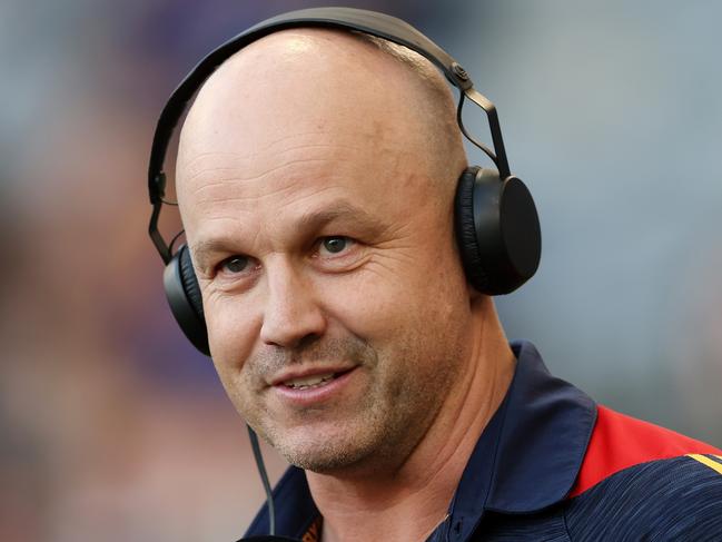 PERTH, AUSTRALIA - AUGUST 26: Matthew Nicks, Senior Coach of the Crows does a radio interview before the 2023 AFL Round 24 match between the West Coast Eagles and the Adelaide Crows at Optus Stadium on August 26, 2023 in Perth, Australia. (Photo by Will Russell/AFL Photos via Getty Images)