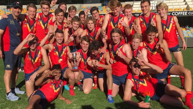 WINNERS: South Australia’s under-16 football team celebrates its national title win. Picture: @SANFL/Twitter.