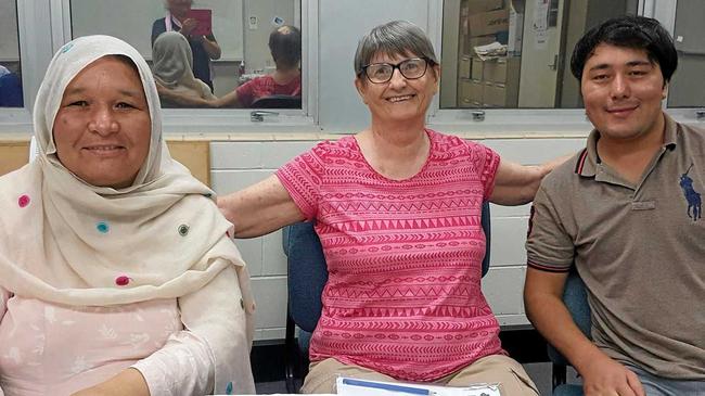 PROUD ACHIEVERS: English tutor Joy Williamson with Katima Ahmadi and her son Mohammad Hossain. Picture: contributed