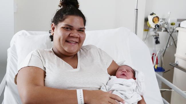 Tamekka Hunting, 21, of Manunda, cradles her newborn daughter Tamila Hunting in the Cairns Hospital maternity ward. Picture: Brendan Radke