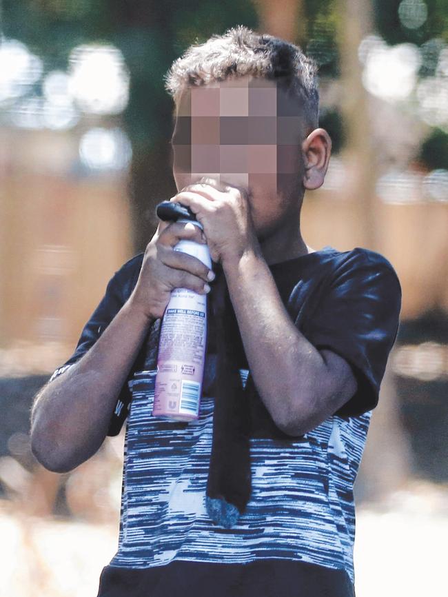 A young boy chroming in a Queensland park.