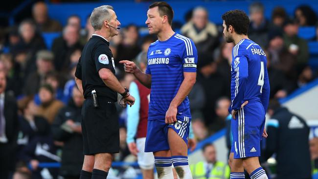 Chelsea captain John Terry remonstrates with referee Martin Atkinson.