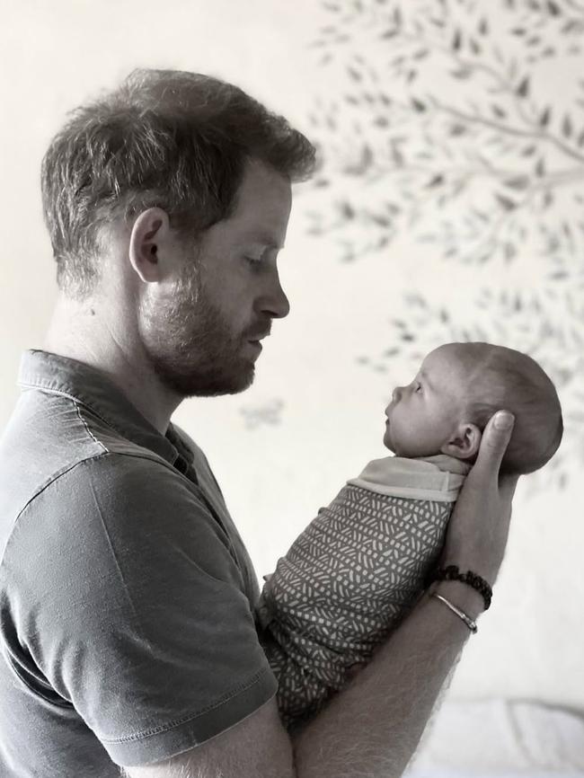 Meghan also shared then-and-now photos of Harry with their daughter.