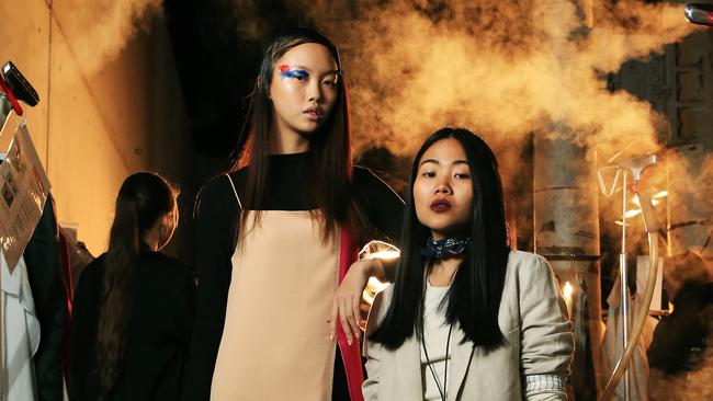 Thai model Jan Baiboon with Raffles College designer Pimnarra Sangngern backstage at Mercedes Benz Fashion Week Australia. Picture: Toby Zerna.