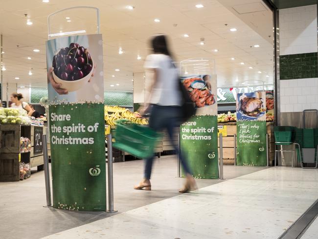 A shopper entering a Woolworths supermarket at Christmas, one of its busiest times. Picture: Supplied.