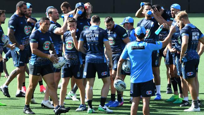 Coach Laurie Daley (right) directs players during the New South Wales training.