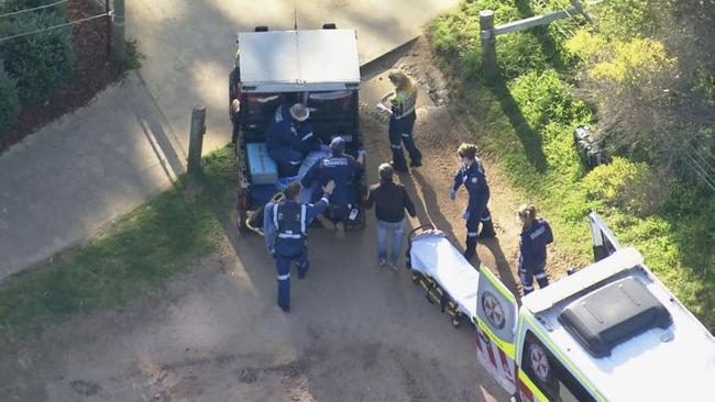 Paramedics work to save Mr Barrionuevo at the scene. Picture: Channel 9