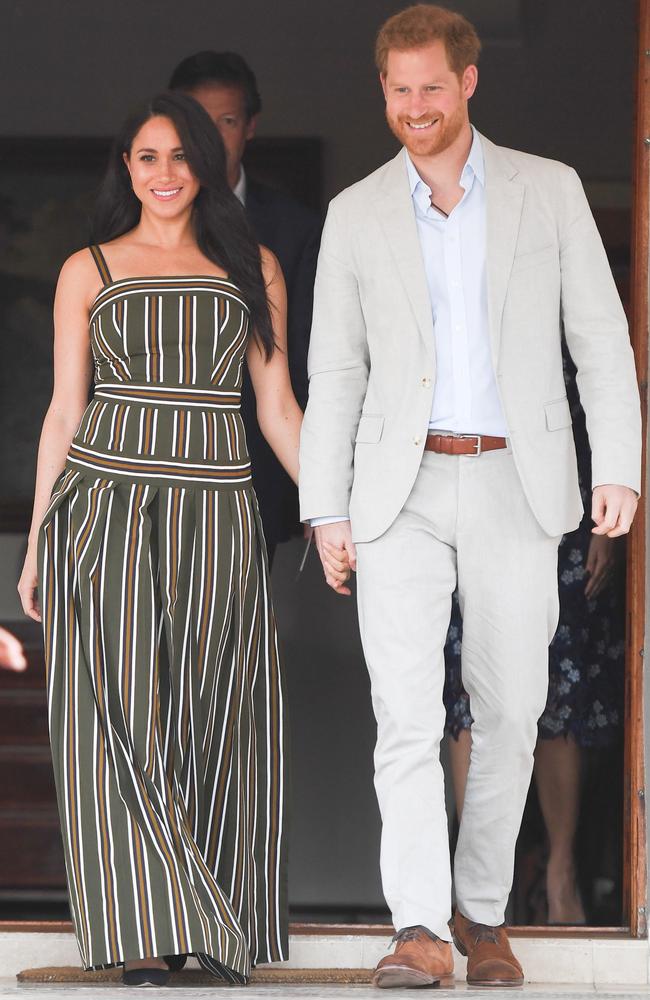 Meghan recycled this striped Martin Grant maxi for her current tour. Picture: Paul Edwards — Pool/Getty Images