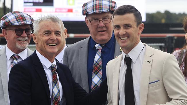 KEMBLA GRANGE, AUSTRALIA - NOVEMBER 20:  Robert  and Luke Price pose after winning the Gong with  Count De Rupee during Sydney Racing at Kembla Grange Racecourse on November 20, 2021 in Kembla Grange, Australia. (Photo by Mark Evans/Getty Images)