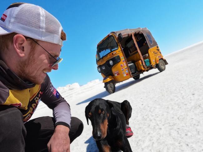 Ryan Magee, his rescued Doberman Patt, and his Tuk Tuk. Photo: Ryan Magee