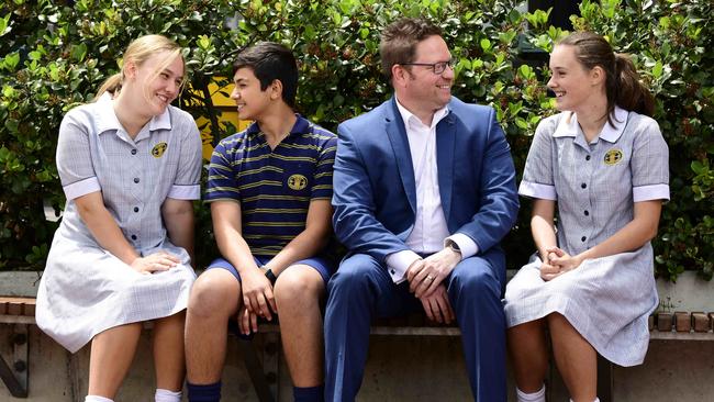 Pembroke Middle School Year 8 students Scarlett Darley, 14, Osman Bademeigil, 14, and Adele Parkin, 14, with Dr Tom Nehmy, at the Kensington Park campus. Picture: Bianca De Marchi