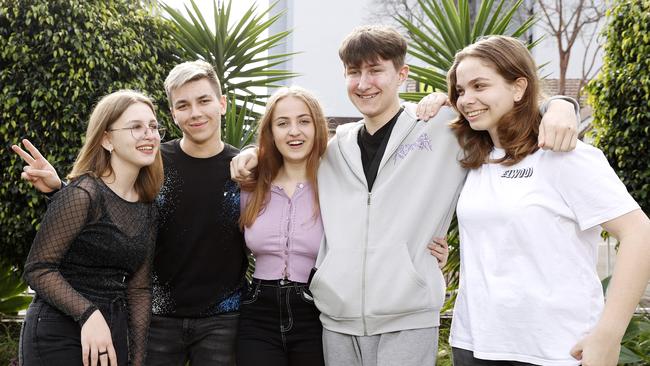 Ukrainian refugee teenagers Nika Kovalneko 14, Daniel Onofrechuk 19, Anhelina Shevchuk 14, Ruslan Hrunda 16 and Sofia Shamanskaya 14, are finding new friends at the Ukrainian Youth Association in Lidcombe. Picture: Tim Hunter.