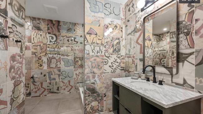 He certainly has an acquired taste in bathroom decor.