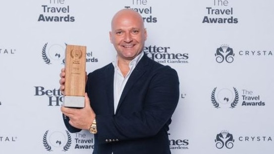 Excite Holidays co-founder George Papaioannou accepting Travel Weekly’s Wholesaler Of The Year Award in 2020. Picture: Facebook