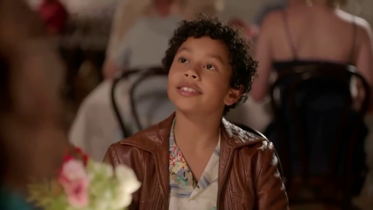 A screen grab from the official trailer of NBC's Young Rock showing young Dwayne dining at “Lorenzo’s”. Picture: NBC