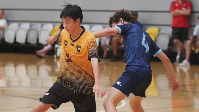 National Futsal Championships 2024 at Carrara. Western Australia (yellow) V NSW Metro U/13 boys. Picture Glenn Hampson