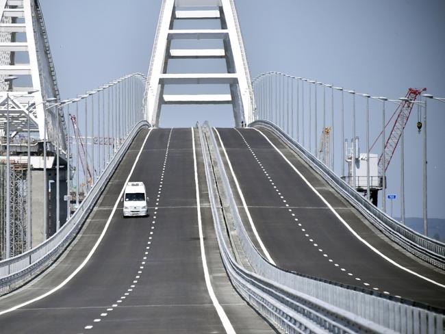 A view of the new bridge linking Russia and the Crimean peninsula prior to its opening ceremony near Kerch, Crimea, Tuesday, May 15, 2018. Russian President Vladimir Putin will attend the opening ceremony of the bridge. (Alexander Nemenov/Pool Photo via AP)