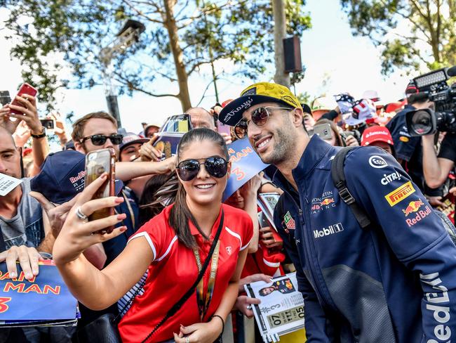 Australian Formula One Grand Prix at Albert Park on March 25, 2018 in Melbourne, Australia. Daniel Ricciardo signs autographs and poses for photos upon arrival at the track. Picture: Jake Nowakowski