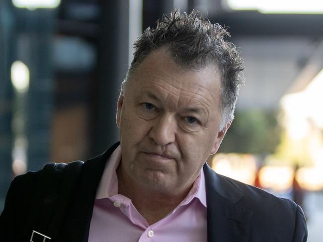 29-05-2024 - PwC CEO Kevin Burrowes walking to his office from Crown Towers Sydney. Picture: Liam Mendes / The Australian