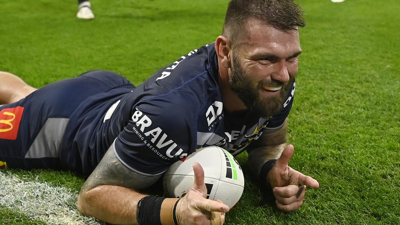 Kyle Feldt celebrates after scoring a try during the match between North Queensland Cowboys and Canberra Raiders at Country Bank Stadium. (Photo by Ian Hitchcock/Getty Images)