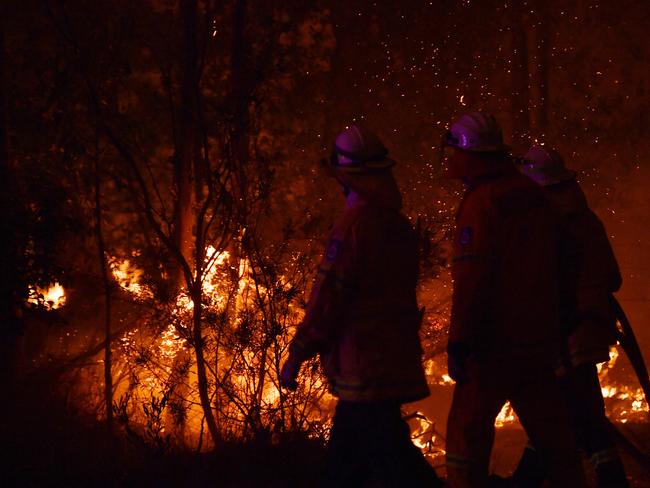 Rural Fire Service firefighters battling fires in NSW. Picture: Sam Mooy/Getty