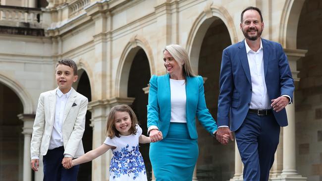 Minister Kate Jones outside Parliament House with her family, husband Paul Cronin, son Thomas, and daughter Grace. Photographer: Liam Kidston