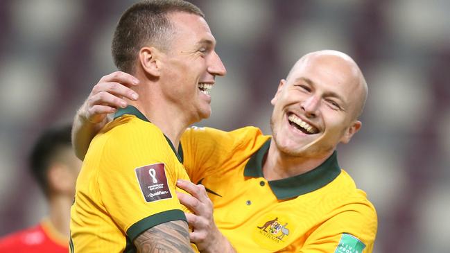 DOHA, QATAR - SEPTEMBER 02: Mitchell Duke of Australia  celebrates after scoring their team's third goal during the 2022 FIFA World Cup Qualifier match between Australia and China PR at Khalifa International Stadium on September 02, 2021 in Doha, Qatar. (Photo by Mohamed Farag/Getty Images)