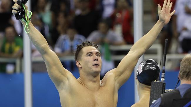 United States' Nathan Adrian celebrates after winning the gold medal in the men's 4x100-meter freestyle final.