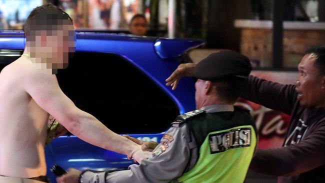 Young Australians behaving badly on the streets of Bali’s Kuta nightclub district are never a good look. Picture: Liam Kidston