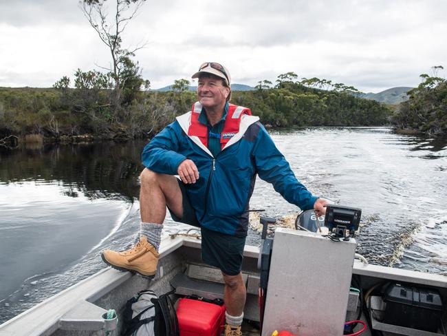 Pieter van der Woude guides his tinny up Melaleuca Inlet.