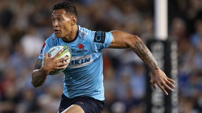 Israel Folau runs the ball during a Super Rugby match between the Waratahs and the Sunwolves in Newcastle in March.