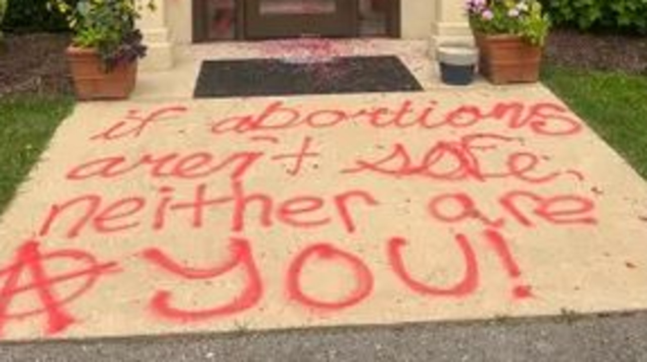 Graffiti in front of the vandalised Mountain Area Pregnancy Services building in Asheville, North Carolina. Picture: Mountain Area Pregnancy Services