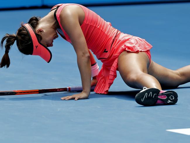 United States' Lauren Davis falls during the energy-sapping third set. Picture: AAP