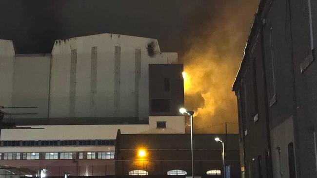 A large fire burning at the BAE Systems shipyard in Barrow-in-Furness, UK, October 30, 2024. Picture: X /  @gabisdbr [https://x.com/gabisdbr/status/1851454824467812720/photo/2]