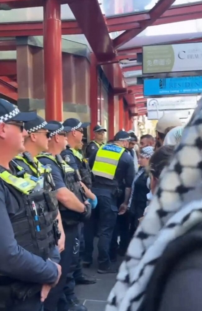 Police lined up outside the building. Picture: Instagram