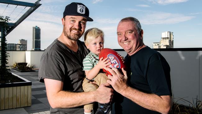 The late Mark Naley with his son, Sam, and grandson, Finn, in February. Picture: Morgan Sette