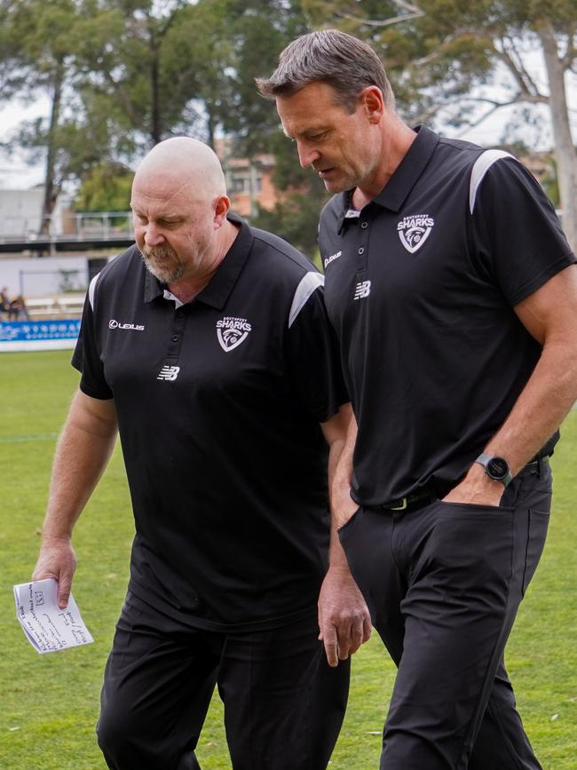 Steve Daniel and Matt Primus talking tactics together. Picture: Southport Sharks.