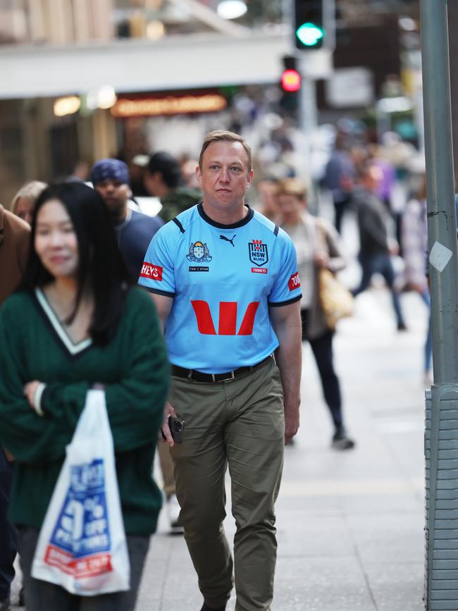 Steven Miles in Queen Street Mall wearing the NSW jersey. Picture: Annette Dew