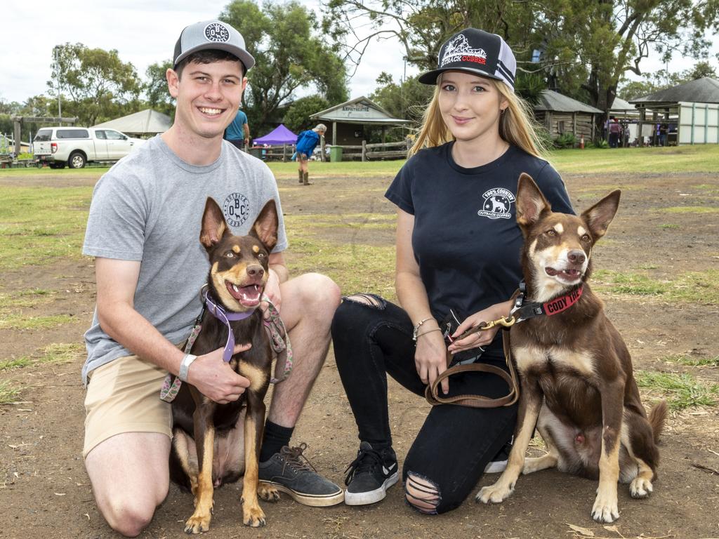 Anthony Salerno and Sarah Lemasurier with Tig and Cody the kelpies on day 3 of the Toowoomba Royal Show. Sunday, March 27, 2022. Picture: Nev Madsen.