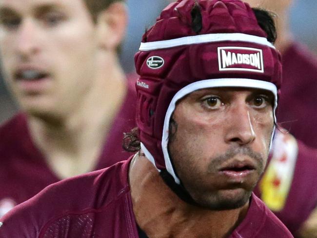 QLD's Johnathan Thurston passes during Game 1 of the 2015 State of Origin series between the NSW Blues and the Queensland Maroons at ANZ Stadium,Homebush .Picture Gregg Porteous