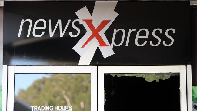 A business owner has pleaded not guilty to attempted arson over a fire at NewsXpress newsagency at Walkerston Shopping Centre.